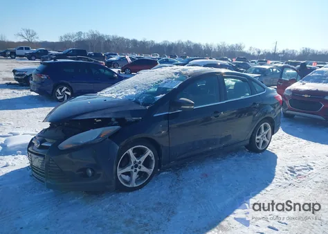 2012 Ford Focus Titanium z USA, uszkodzony, nr VIN 1FAHP3J20CL297540